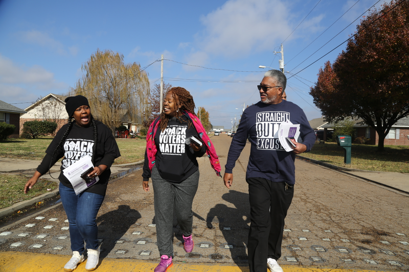 Ashley McKay Dandrige, right, LaTosha Brown, middle, and Kermit Moore, right, canvassing in Tunica, Miss., on November 24, 2018.